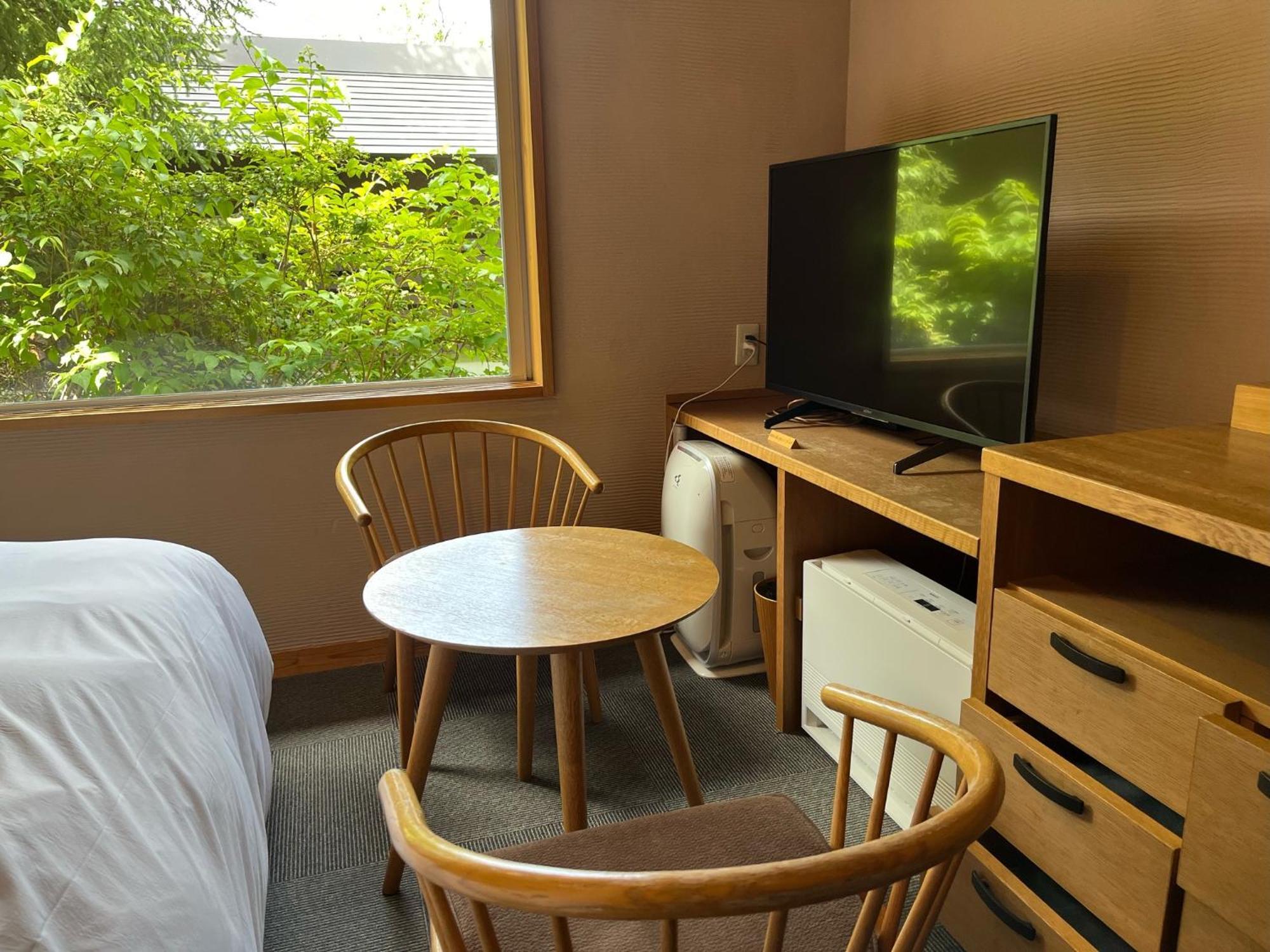 Miyama Ouan Kyoritsu Resort Takayama  Kamer foto A room at the hotel